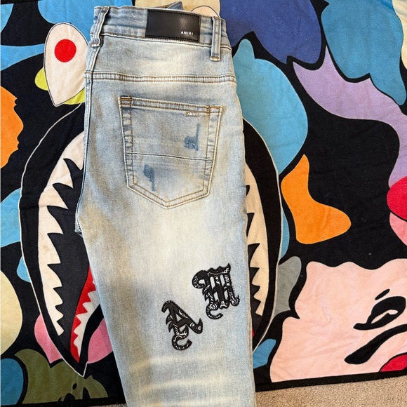 AMIRI Light Blue Skinny Jeans with Black Patch - Picture 1 of 5